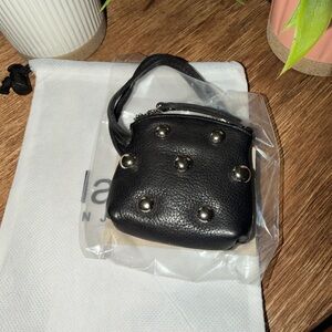 Black Studded Mini Wristlet Bag charm